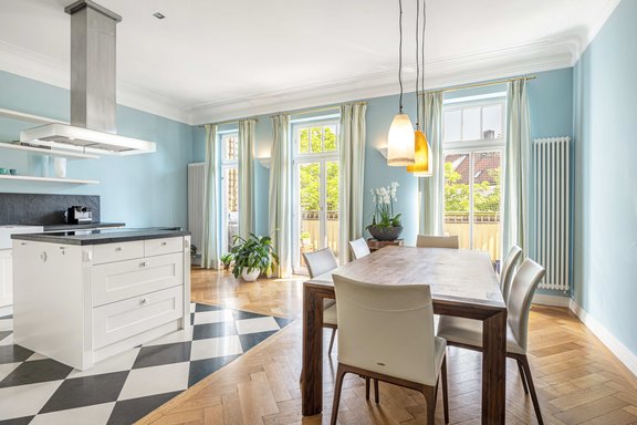 Cooking, dining area with balcony access