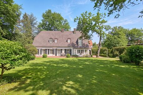 An exceptionally charming historic villa with a magnificent garden and pool