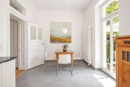 Dining area in the eat-in kitchen with access to the south-facing balcony