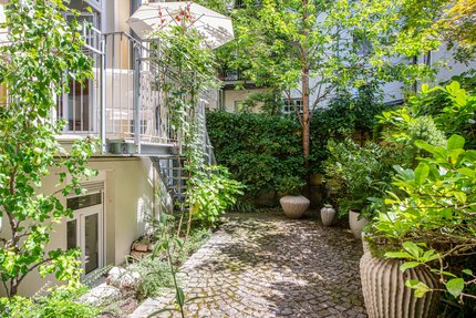 A terrace and south-facing garden extend living to the outside