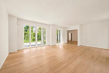 On the high banks of the Isar: a quiet, sunny garden apartment in a prime location in Harlaching