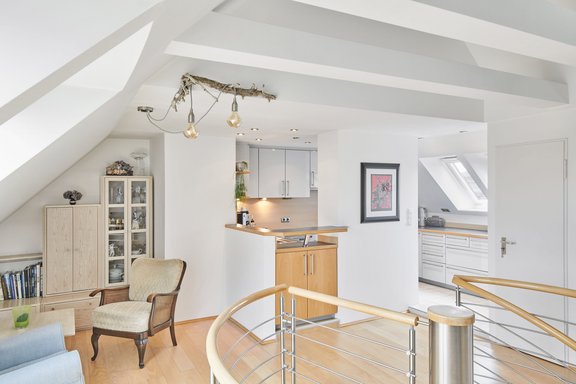 Living, eating and cooking in the converted attic space