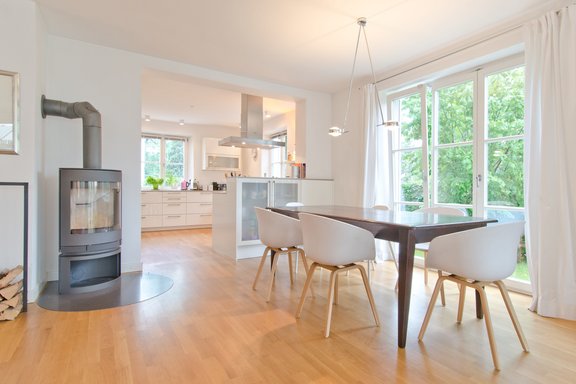 Open living and dining area with modern kitchen