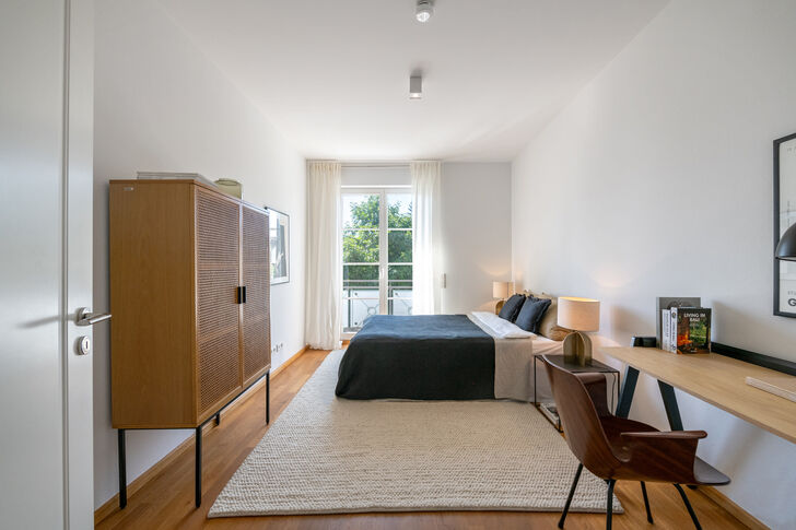 Bedroom with balcony access