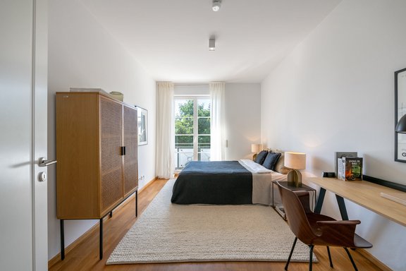 Bedroom with balcony access