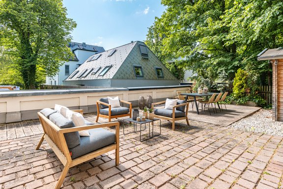 The private sun terrace offers an enchanting setting in an urban location