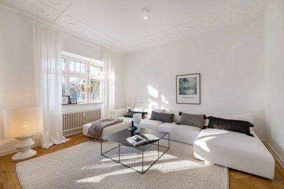 Art Nouveau stucco ceiling gives a stylish setting for living