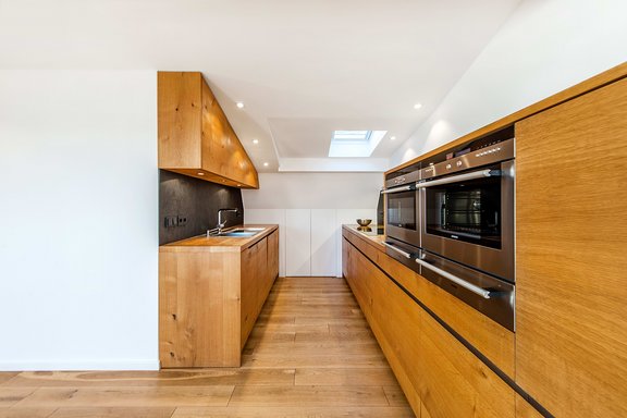 Cabinet made kitchen with branded appliances