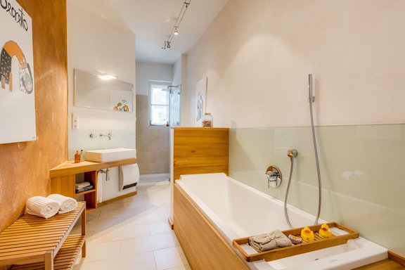 Bathroom with tub and shower