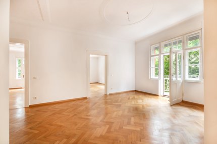 Original herringbone parquet flooring and beautiful stucco ceilings