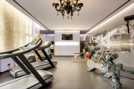 Bright gym with wellness area