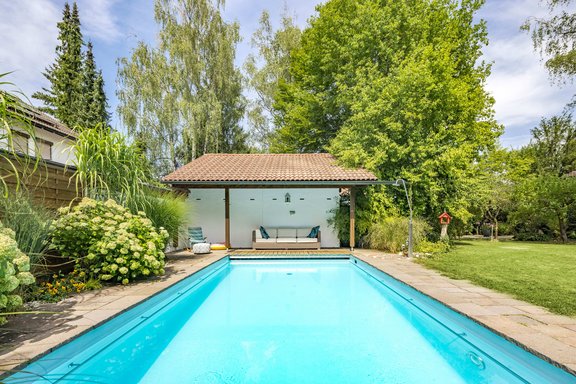 Pool area with wooden deck