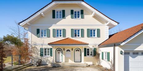 Elegant country-style villa with a separate guest apartment or office area