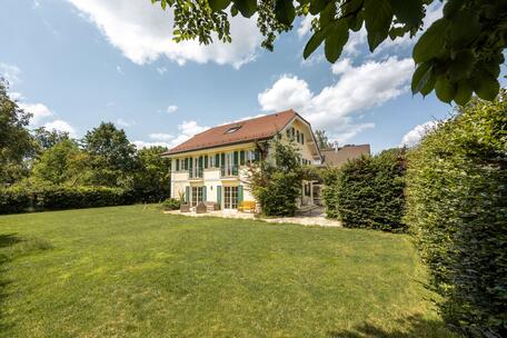 Elegant country-style villa with a separate guest apartment or office area