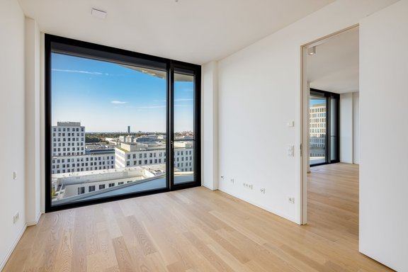 Light-flooded bedroom with built-ins
