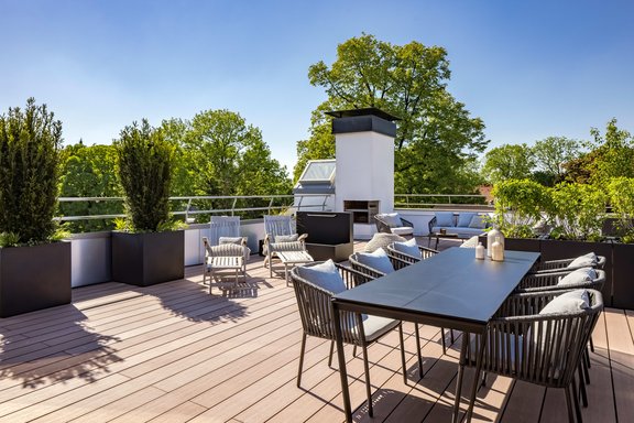Terrace with fireplace and fountain