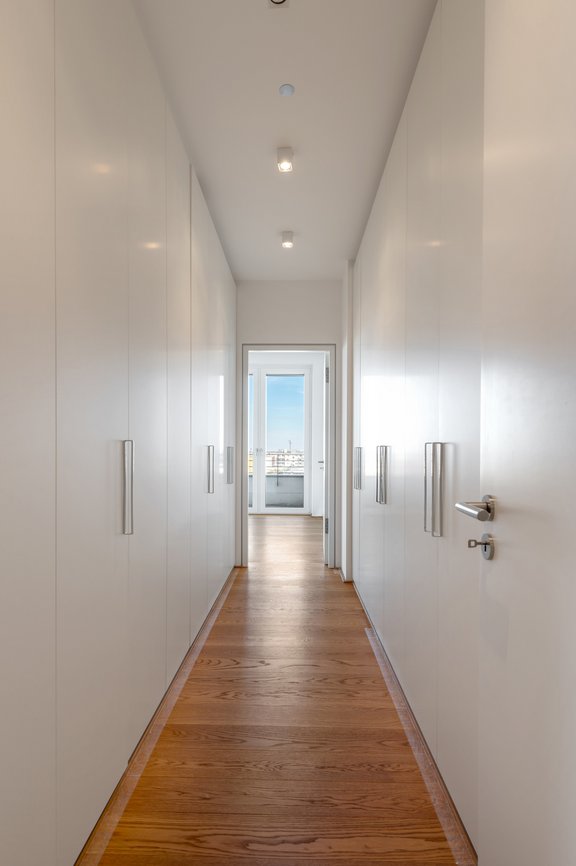 Fitted carpentry wardrobes in the dressing area