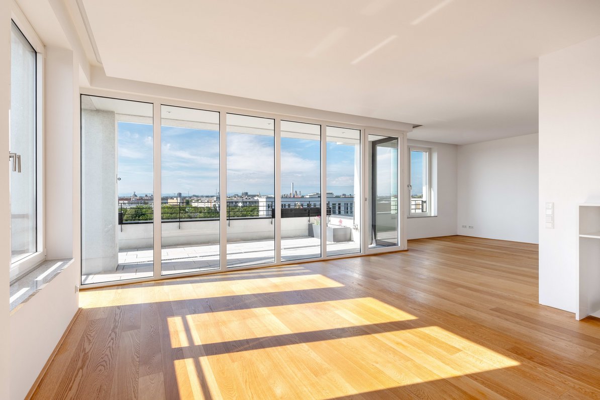 Living/dining area with terrace access