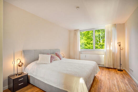 Spacious bedrooms with a view of the countryside