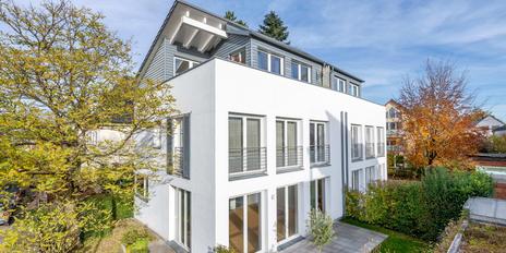 Family-friendly, currently rented semi-detached house with timeless modern aesthetics and solar thermal energy
