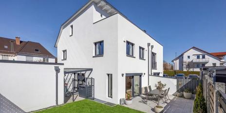 Family-friendly semi-detached home with a modern design, featuring a south-facing terrace and garden