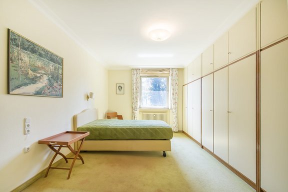 Bright bedroom with built-ins