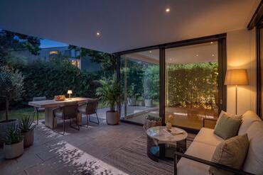 A Garden Idyll in a Prime Location in Herzogpark: Exclusive 3.5-room apartment in a modern, designer villa