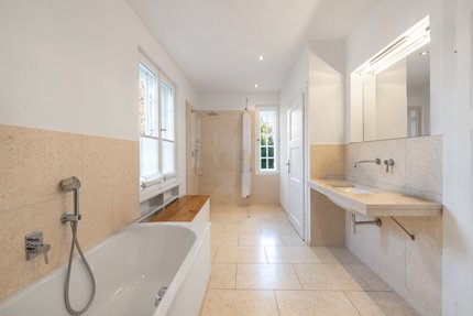 Master bathroom with natural stone tiles