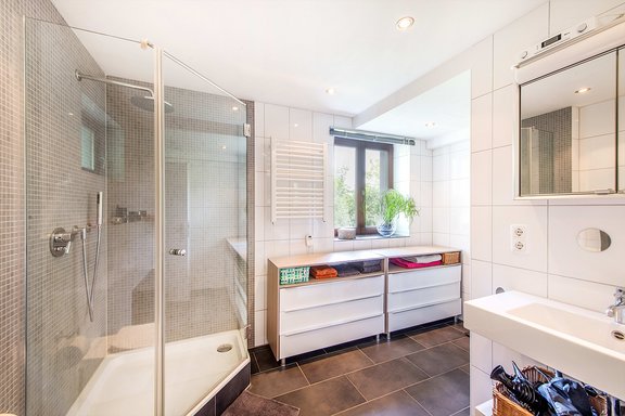 Modern bathroom with tub and shower