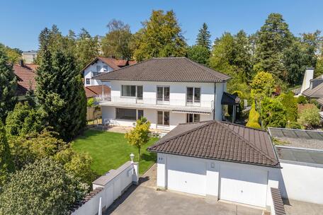 Spacious home with park-like grounds and a building lot in the garden that can be physically subdivided