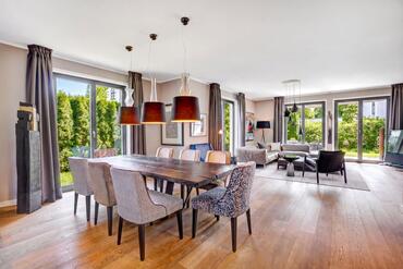 House-within-a-House: Spacious home with a stylish design aesthetic and a sunny garden