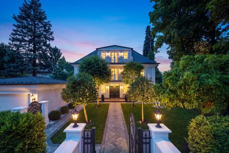 Stately villa with classic charm and a park-like garden