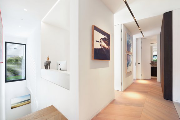 A central hallway connects the rooms