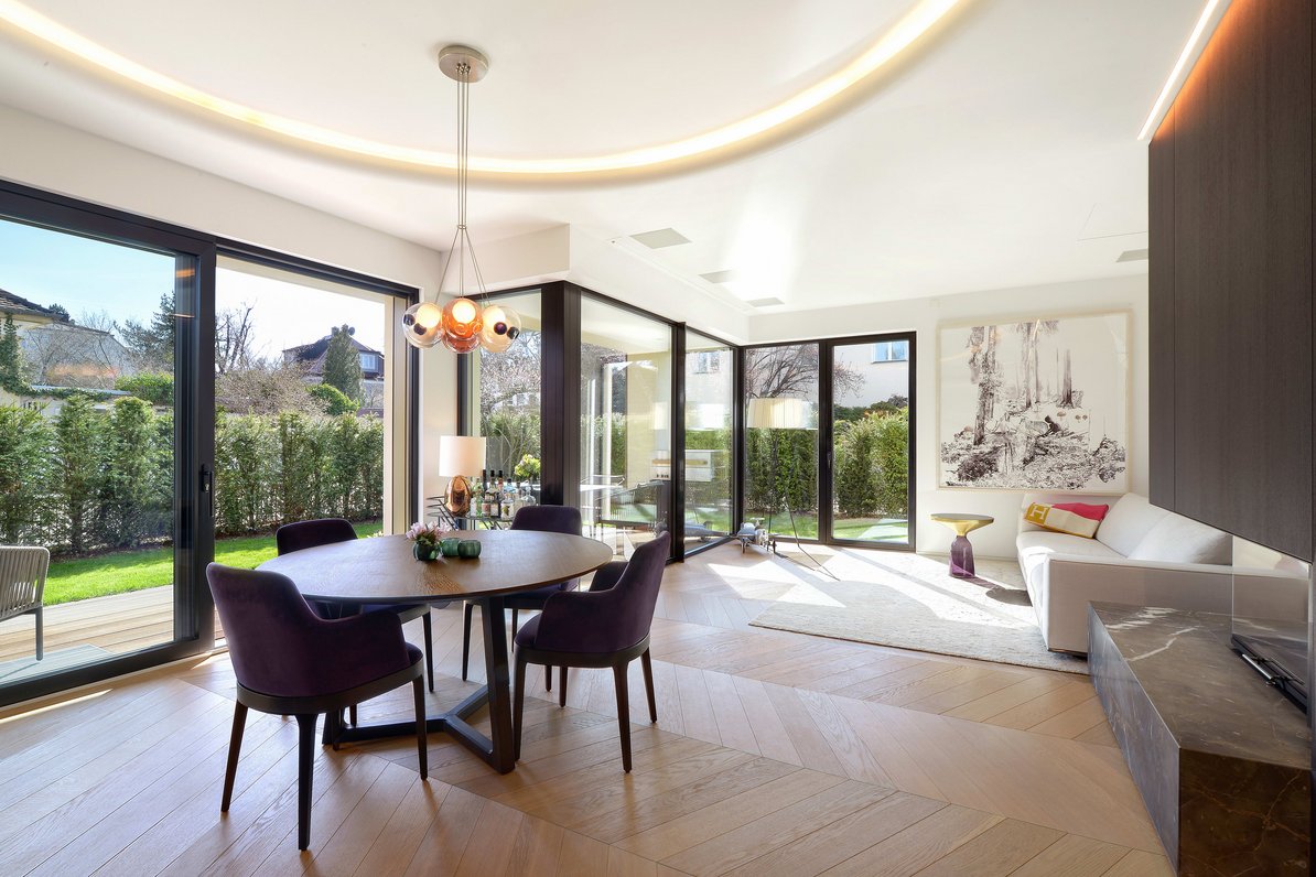 Floor-to-ceiling glass fronts in the living area make the garden part of the living area