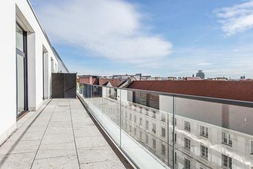 High-end apartment in prominent city location with luxury furnishings, patio and south-facing terrace