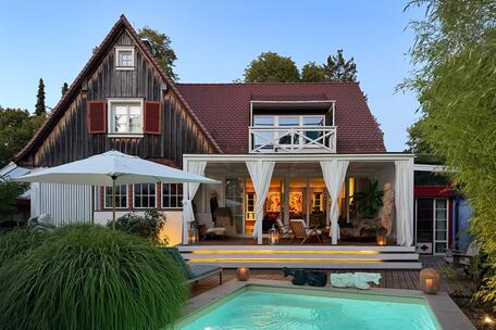 A historic gem from 1913 near Blutenburg, featuring a pool and an artist's studio