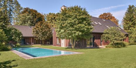 In an unspoiled, idyllic setting: a designer villa with a pool, spa, and guest apartment