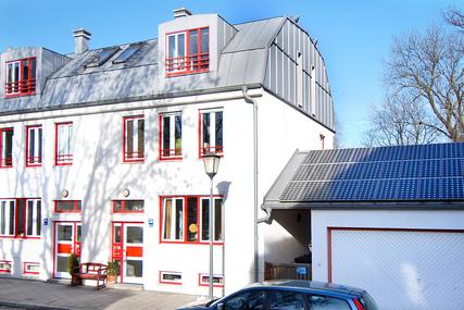 Individually designed semi-detached house with beautiful living ambience and small garden