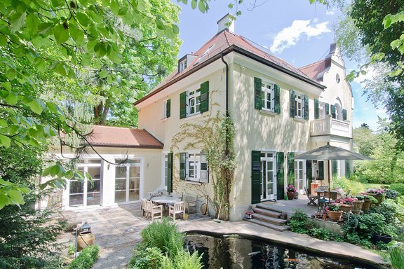 House view with pond and extension