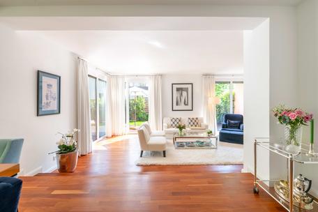 Jewel in an enchanting garden location: stylishly modernized half of a house