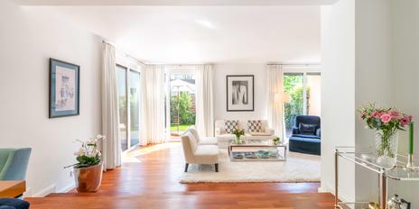 Jewel in an enchanting garden location: stylishly modernized half of a house