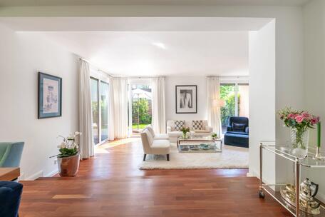 A gem in an enchanting garden setting: a stylishly renovated half of a house