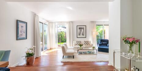 A gem in an enchanting garden setting: a stylishly renovated half of a house