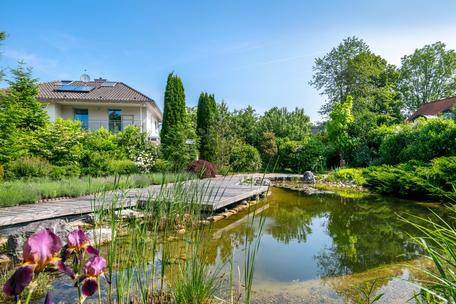 Classic aesthetics: Stylish detached house with a naturally designed dream garden