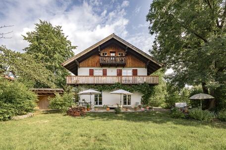 A Rural Gem on Lake Staffelsee: An ecologically renovated country estate dating from around 1931, featuring a breathtaking panoramic view and a guest house