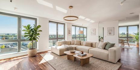 A bright, airy 3-bedroom apartment with penthouse-style charm and views of the Alps