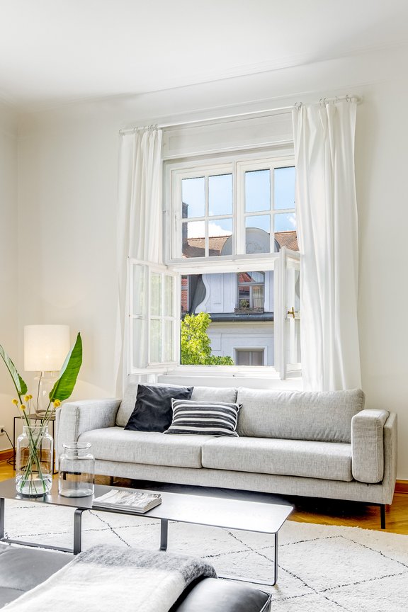 White muntin windows create a stylish ambience
