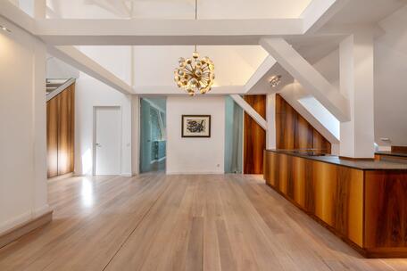 A Light-Filled Home in a Prime Location: Penthouse Apartment with a Corner Tower in a Palace Built in 1899