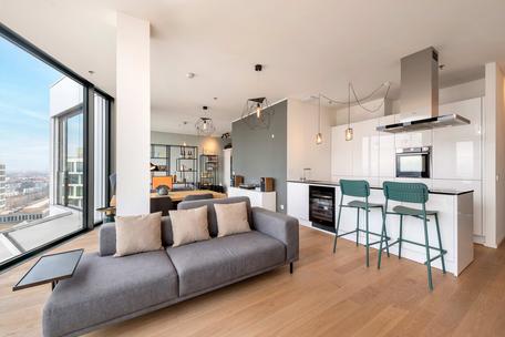 Living at the top: Modern city residence on the 14th floor with concierge and rooftop access