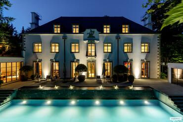 A luxuriously renovated gem of a villa from 1928, featuring a pool, a movie theater, and a hammam